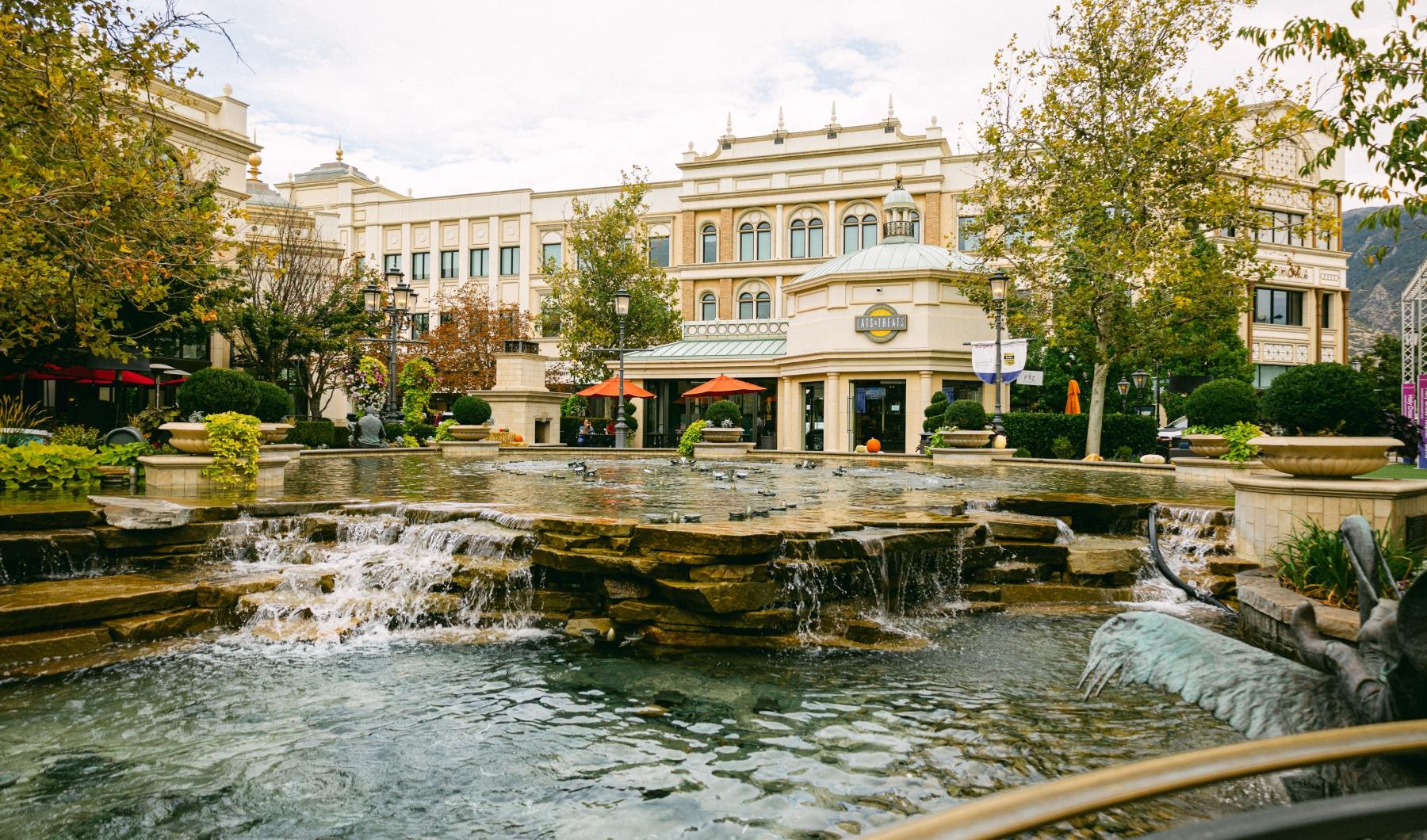 a fountain in front of a building